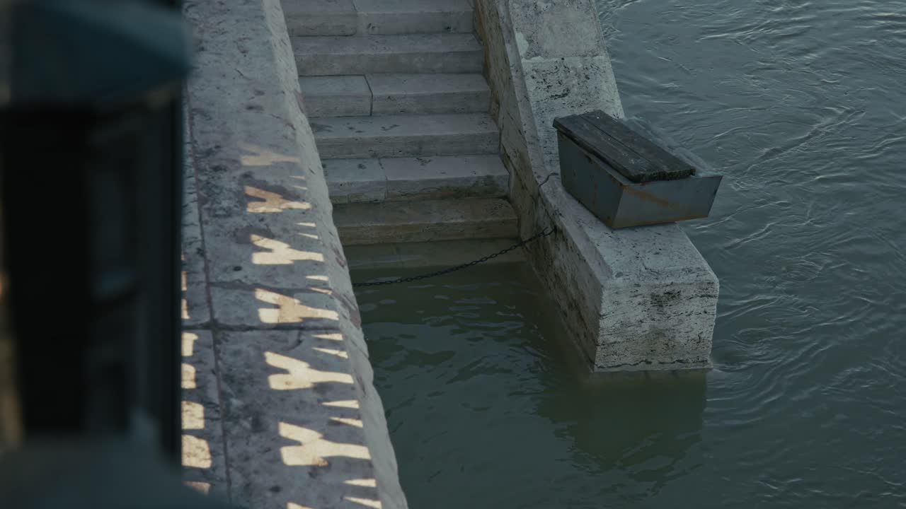 Stone Steps Leading to a River During High Water