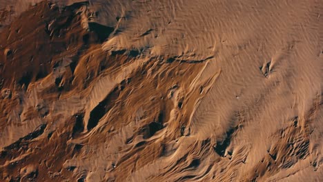 Revealing-upward-shot-of-the-dunes-of-the-Ebro-Delta,-Tarragona,-Spain---Aerial-View