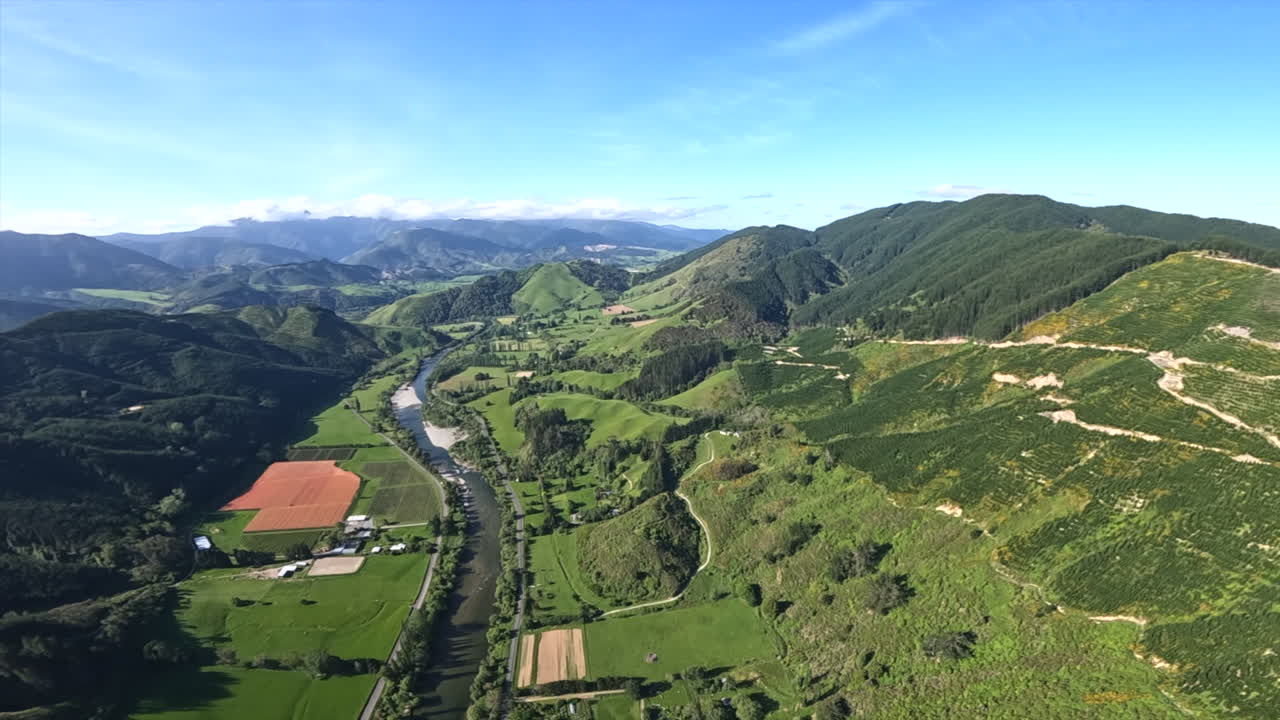 Aerial helicopter shot flying over the Motueka river, New Zealand