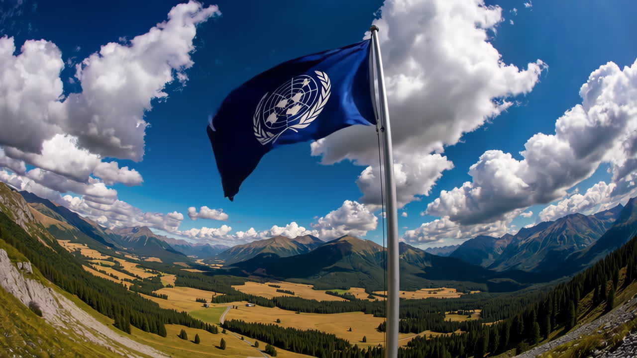 United Nations Flag Flying Over Scenic Alpine Valley