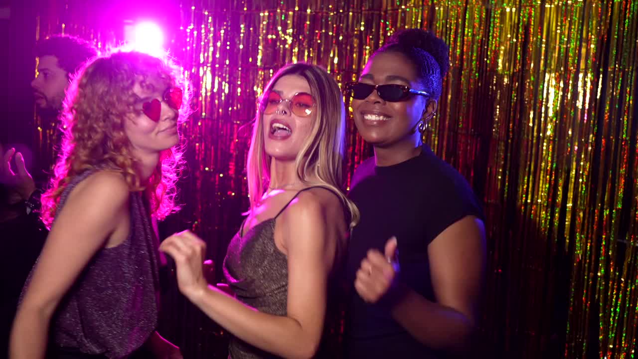 Group of Women Enjoying a Night Out at a Party
