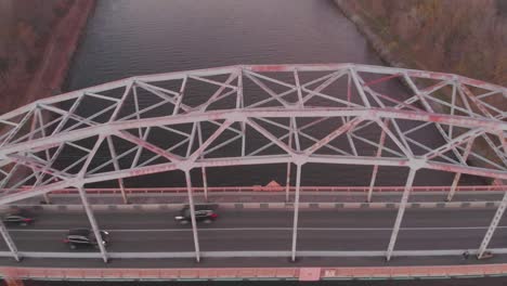 upper view river bridge with traffic autumn forestry banks