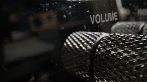 close-up of volume controls on a guitar amplifier