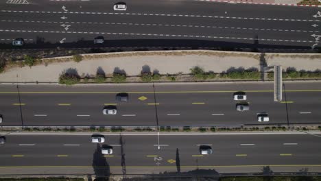 Top-down-aerial-view-of-a-road-in-israel-trucking-to-right-UDH