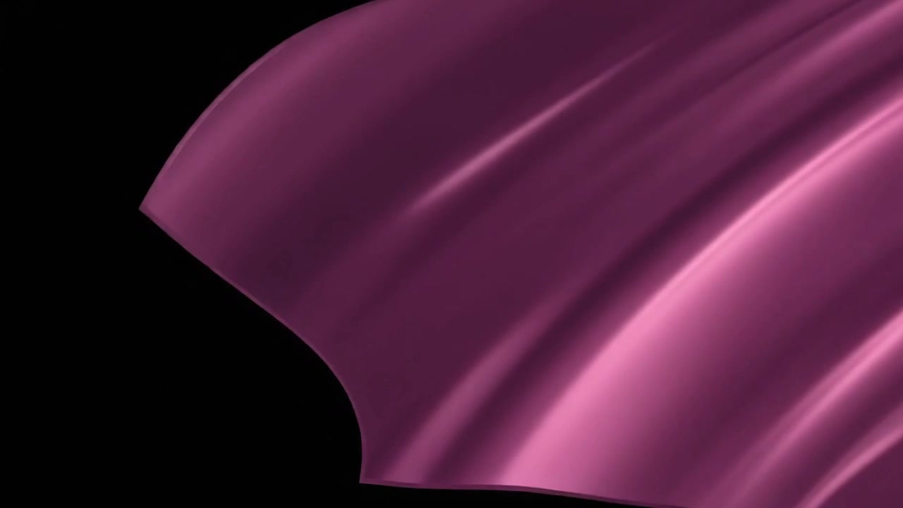 Smooth Purple Fabric Unfolding Against Black Background