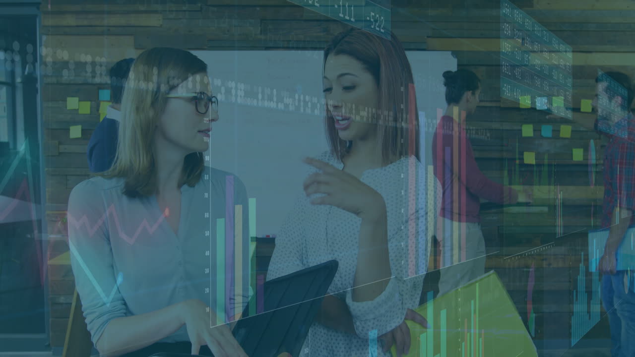 In modern office, businesswomen discussing digital financial graphs with animation
