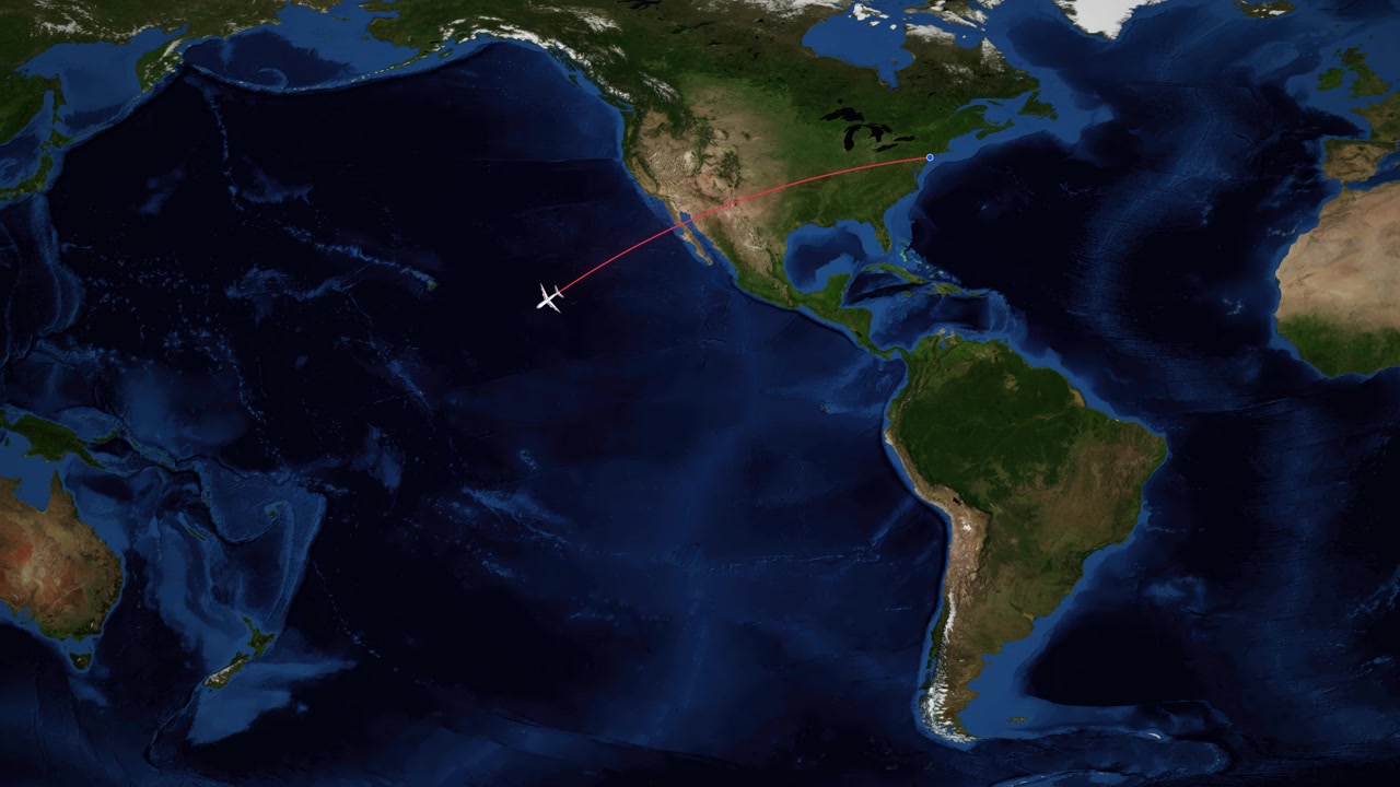A red line tracks an airplane flying across the Pacific Ocean on a world map