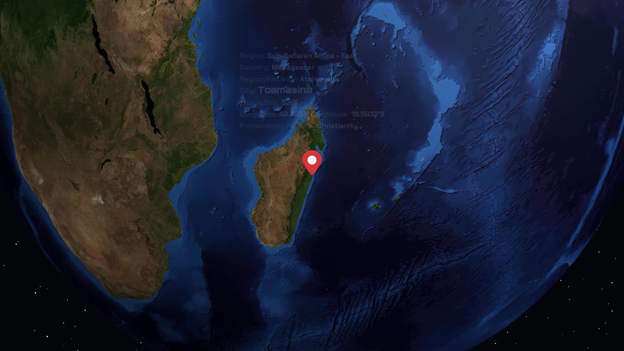 Digital globe rotates and zooms into Madagascar, displaying city information and location pin overlay