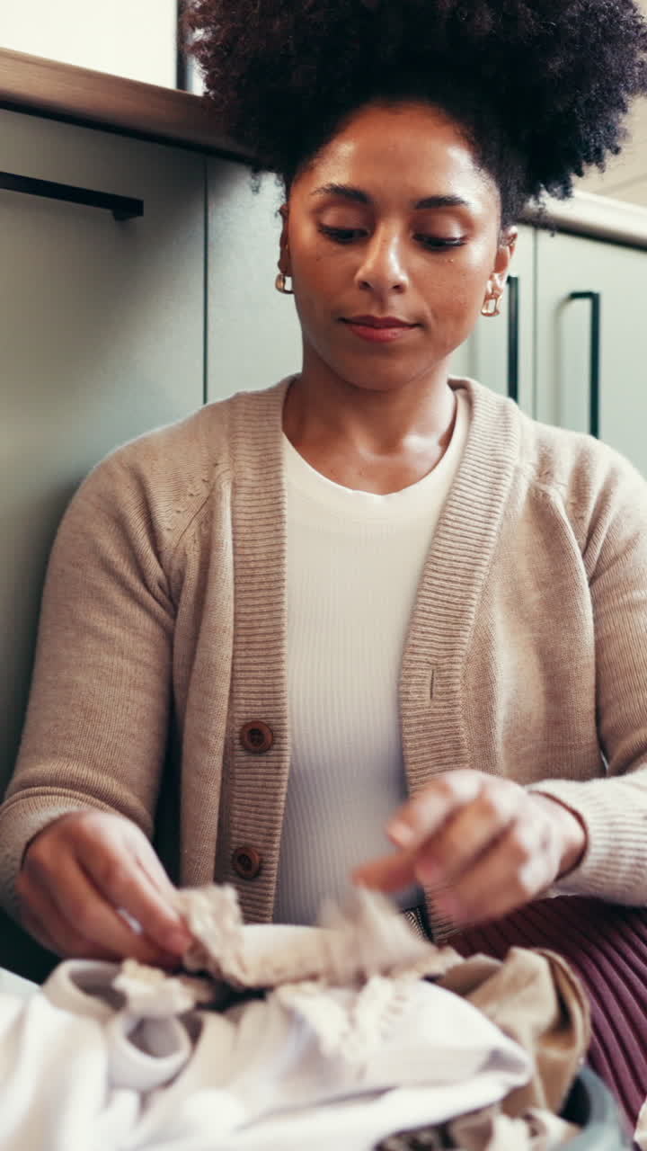 Woman doing laundry indoors