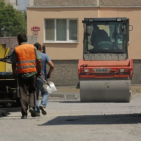 workers making asphalt road