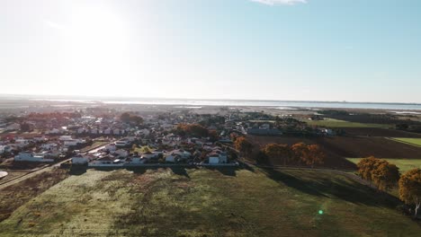 Aerial-establishing-shot-of-the-small-rural-town-of-Candillargues-in-France