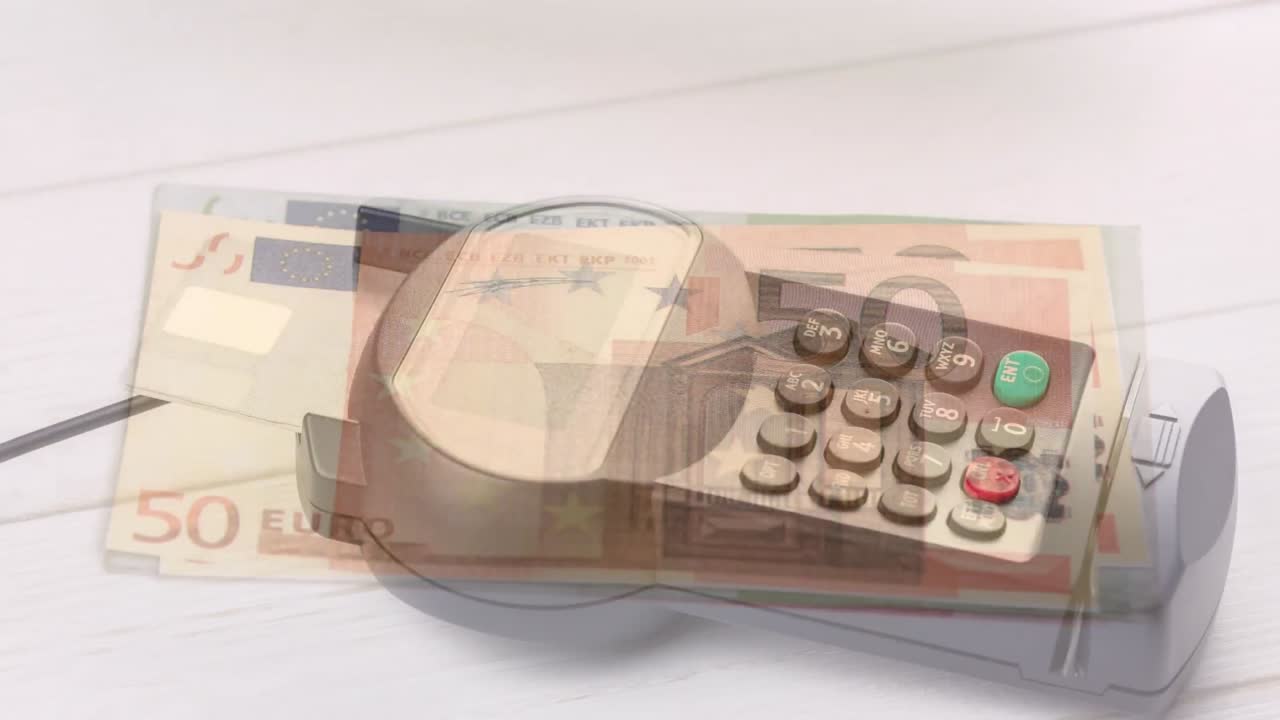 animación de billetes en euros que caen sobre el terminal de pago