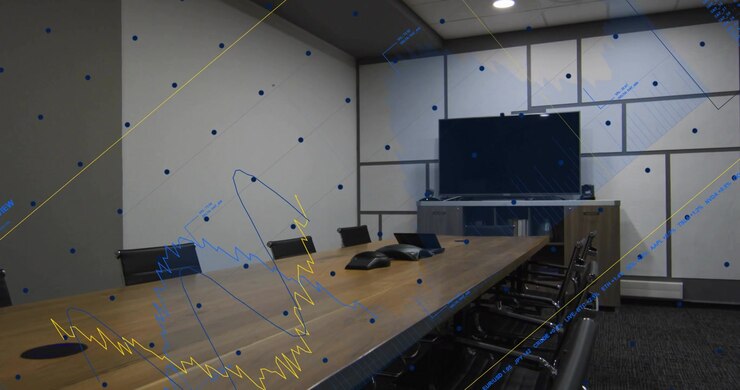 Wooden table with phones still on data start animating blue waveforms to display for business