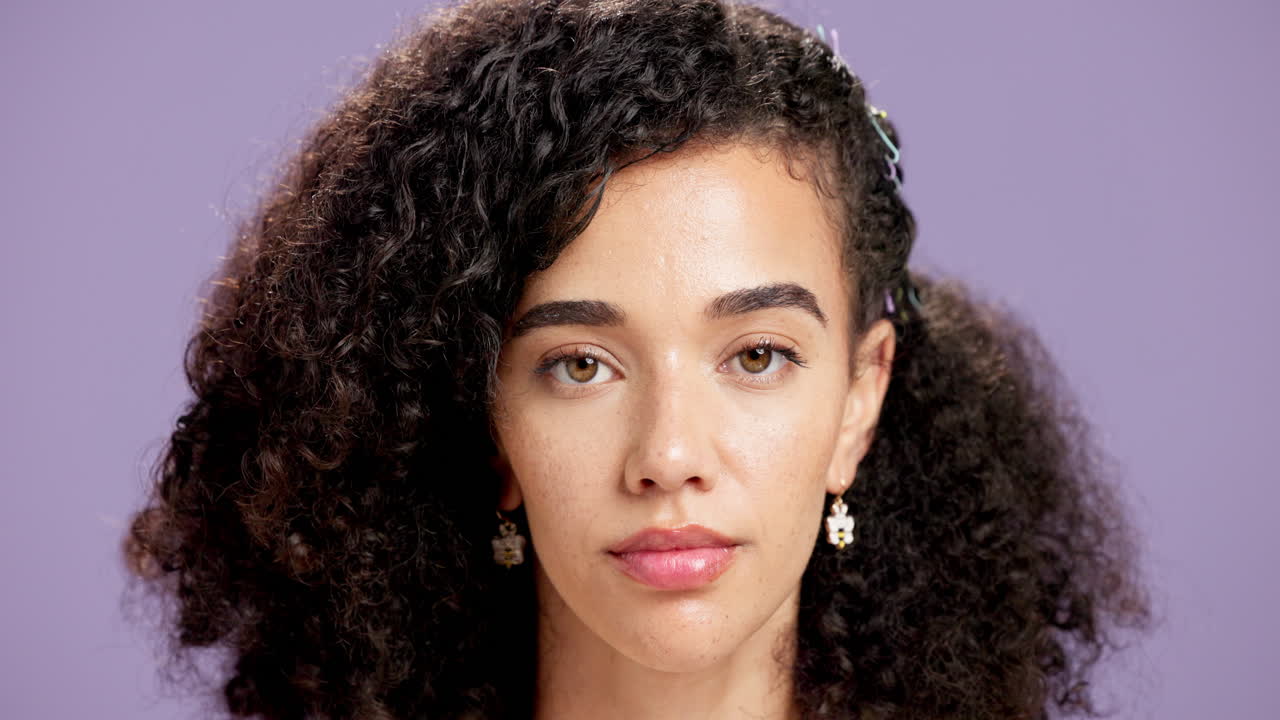 Portrait of a Beautiful Woman with Curly Hair