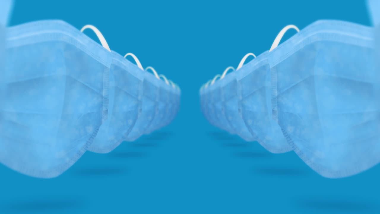 바이러스로부터 보호하기 위해 입과 코를 는 많은 의료 마스크. 건강 관리 개념. 3d 현실적인 의료 마스크, 루프 애니메이션.