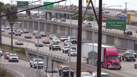 traffic moves slowly along a california freeway near san diego