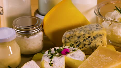 various dairy items arranged on a wooden surface