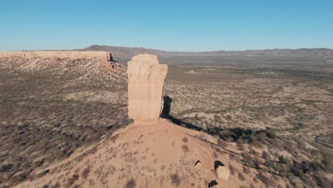 high altitude drone aerial video footage of impressive rock formation vingerklip, namibia, africa. tall stone monument in african desert. monument valley look alike. vast namibian outback.