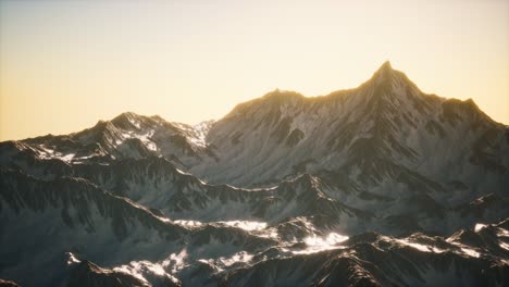 aerial view of the alps mountains in snow