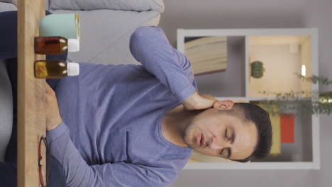 vertical video of sick man suffering from neck pain.