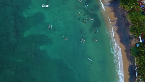 Sri-Lanka-Tropical-Beach-with-Fishermen-Canoe-Boats,-Top-Down-Aerial