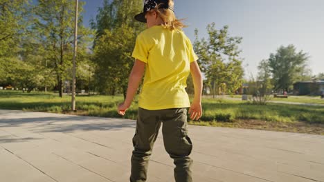 child skateboarding in a park