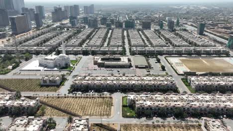 Aerial-View-Of-Modern-Houses-Bahria-Town-Housing-Estate-In-Karachi-With-Masjid