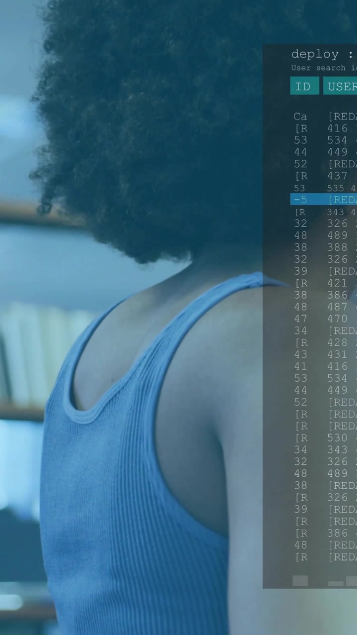 Vertical video: Woman turning by shelf as deploy UI appearing and marking row, checking tech IDs