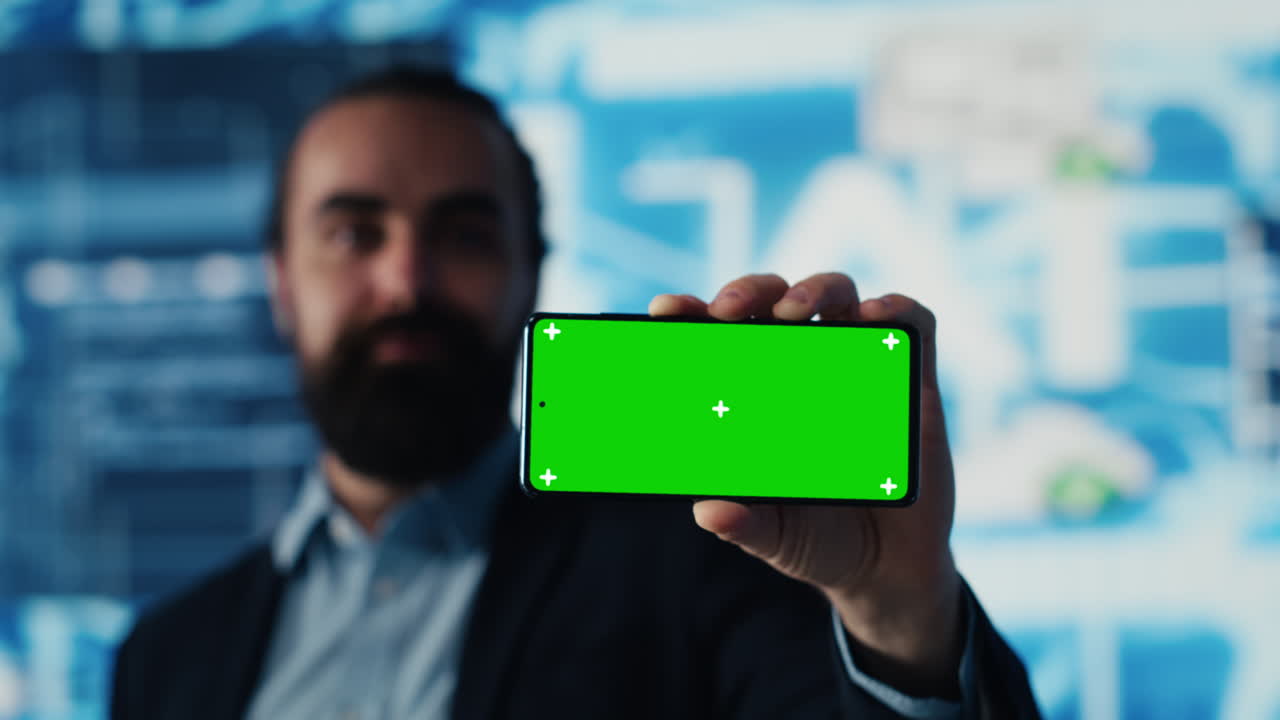 Entrepreneur explores virtual intelligence with green screen on device