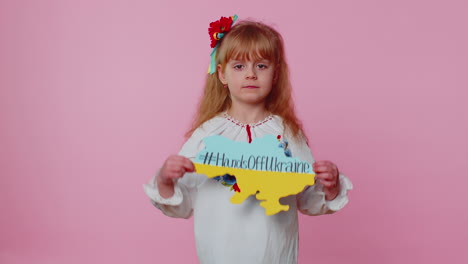 portrait of ukrainian girl child with massage inscription text on map hands off ukraine, crisis, war