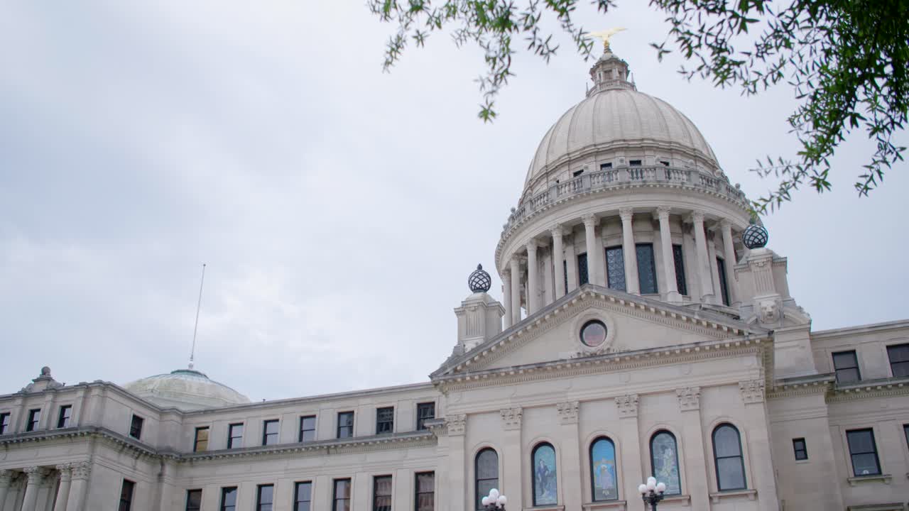 Stormy skies over the Mississippi State Capitol building. Jackson, MS. Medium rack, dome and wing
