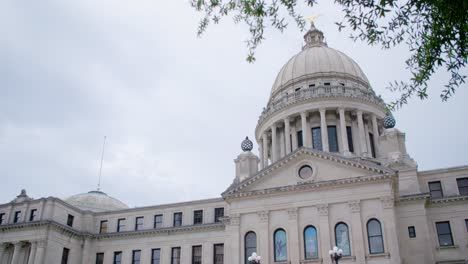 stormy skies over the mississippi state capitol building. jackson, ms. medium rack, dome and wing