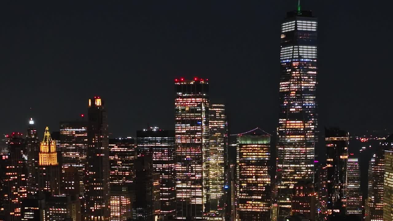 Explore the vibrant skyline of New York City at night from above