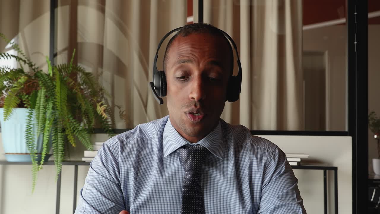 African businessman negotiate to client remotely use video conference application