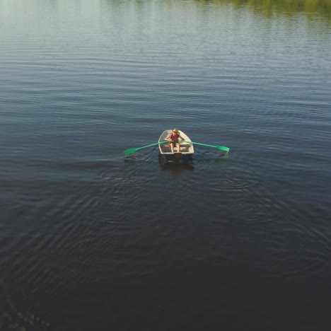 tourist rowing a boat