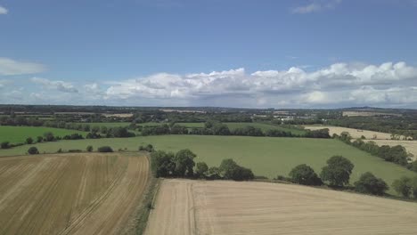 aerial fly over, irish countryside, farmers fields in 4k