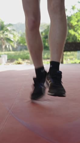 Exercising with jump rope outdoors