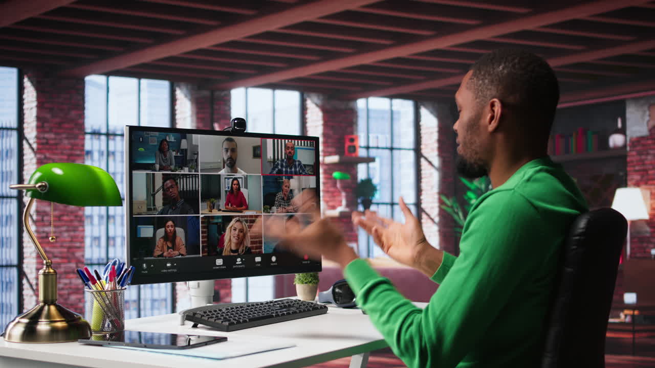 Vertical Video Manager talking to employees during web video call at home