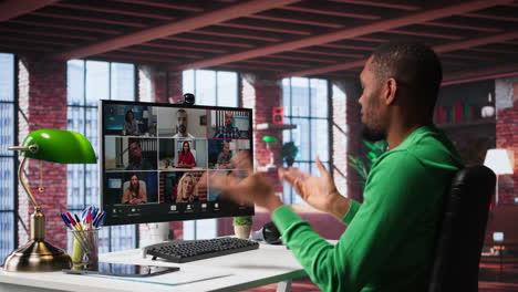 vertical video manager talking to employees during web video call at home