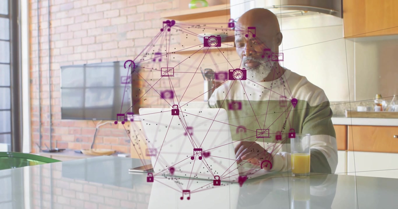 mature man opening laptop and typing triggers rotating purple network sphere for tech visualization