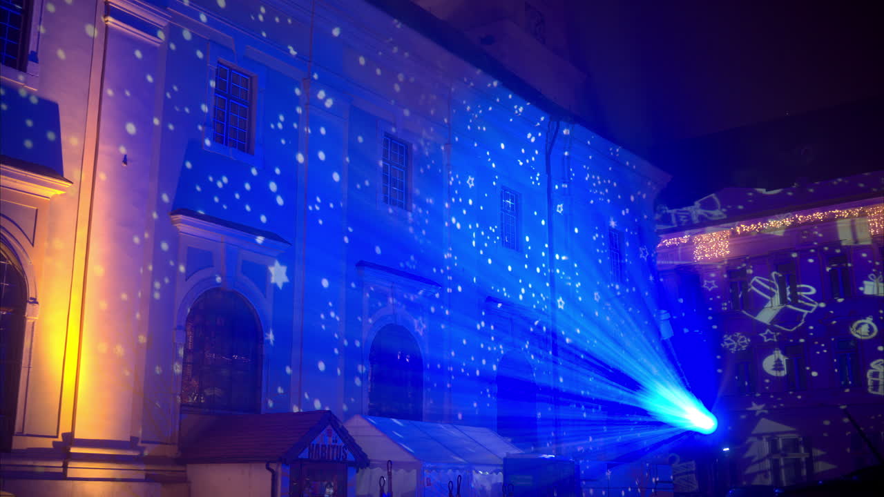 Blue Christmas projections on the buildings in the center of Brasov, Romania