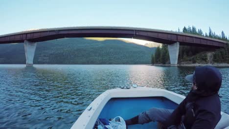 man travelling in a boat in the river 4k