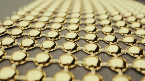 close-up of gold beaded fabric