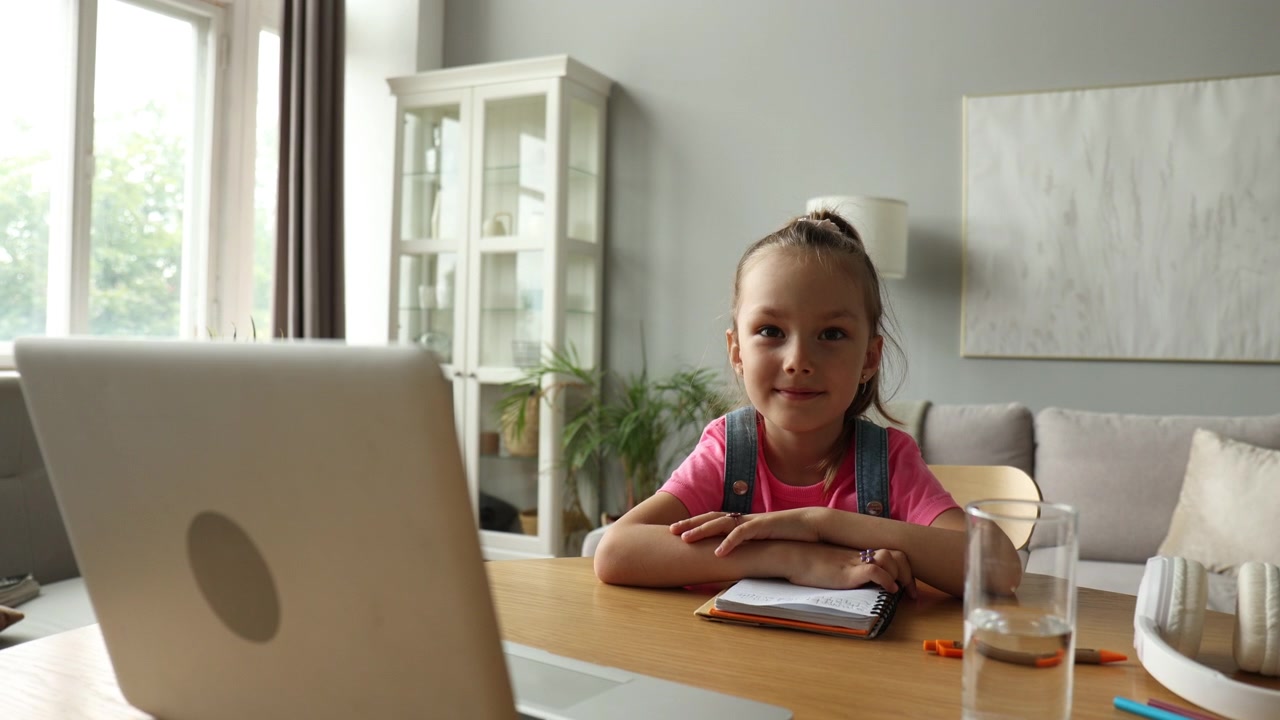 Happy Young Girl Attending Online Class at Home