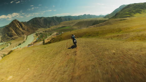 motorcyclist navigates rough terrain fpv. visual echo of speed agility and indomitable will of sportsmen embracing extreme sports. adrenaline-fueled achievements