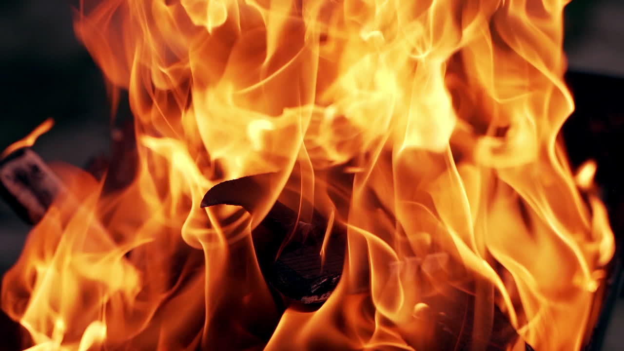 Burning Wood. Burning fire in a home fireplace. Slow motion