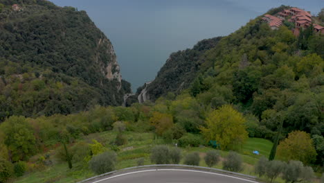 scenic, cinematic view of idyllic location on mountain top with amazing view towards lake garda