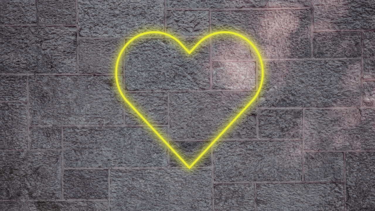 signo de corazón de neón en la pared de ladrillo 4k