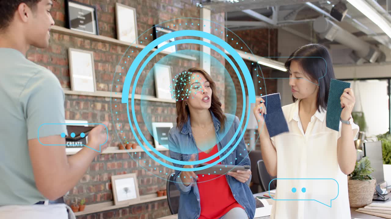 Standing coworker lifting swatches sparking designer tapping tablet, HUD pulsing on face for design