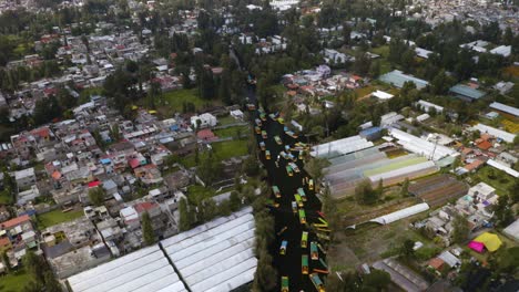 drone flies backwards over xochimilco unesco world heritage site